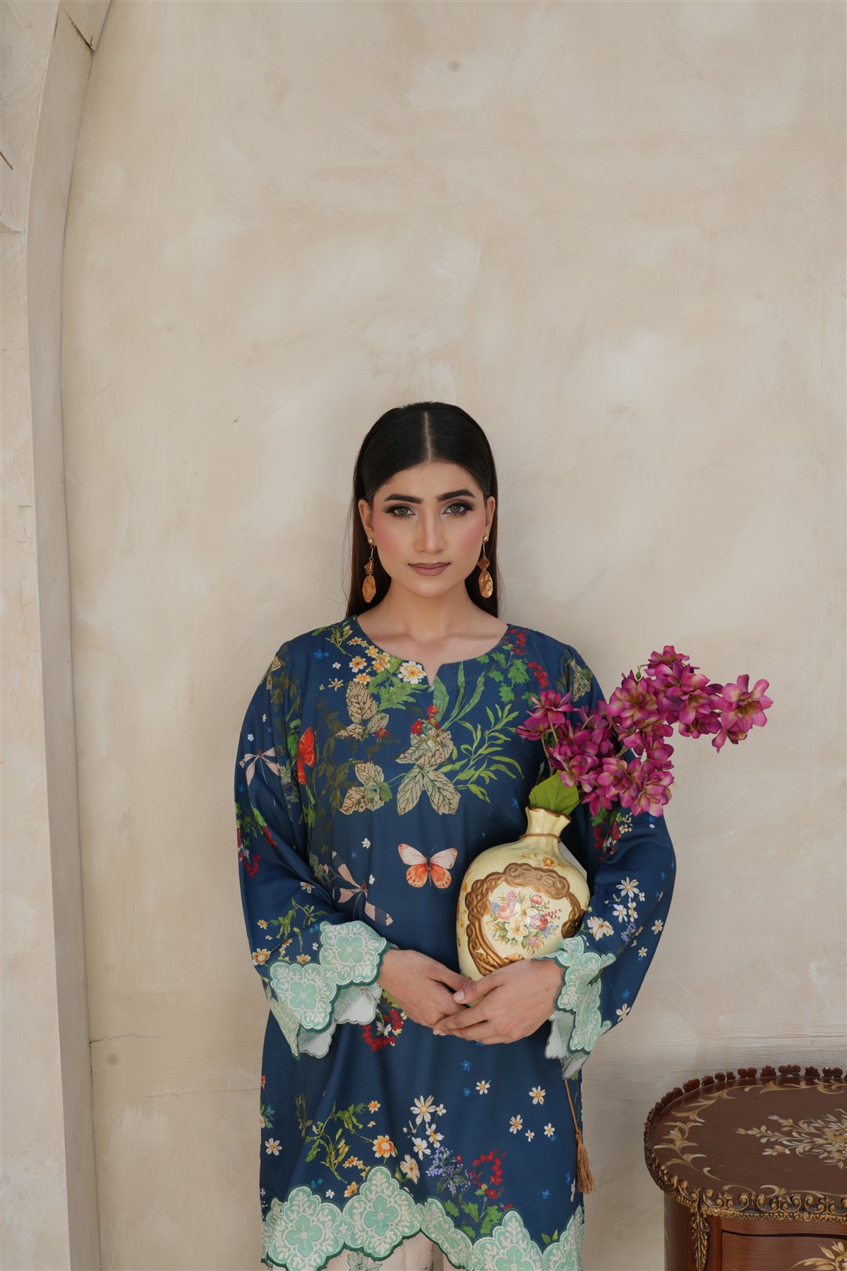 Husnara blue floral ensemble portrait